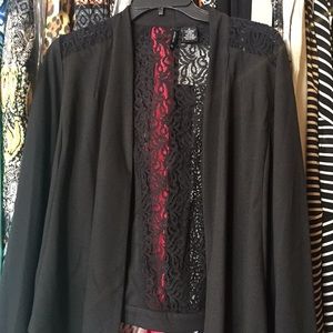 A brand new medium black cardigan.